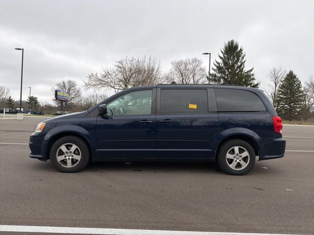 Used 2012 Dodge Grand Caravan SXT with VIN 2C4RDGCG7CR236734 for sale in Walled Lake, MI