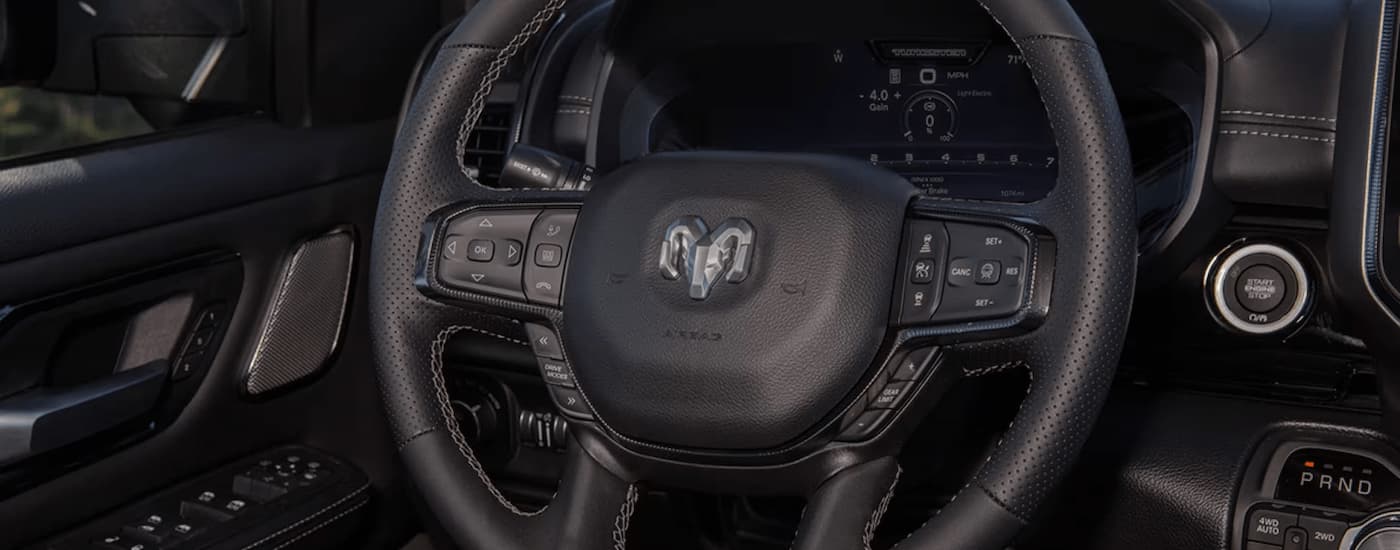 Close up of the steering wheel on a 2025 Ram 1500 Big Horn