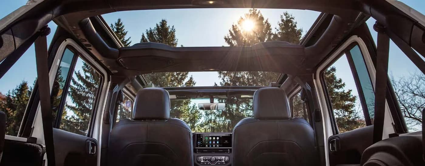 Front seats and open roof in a 2026 Jeep Wrangler